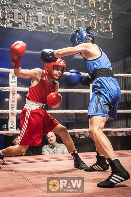 Louie Taylor throws an overhand right